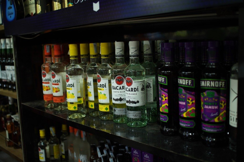 Bacardi Carta Blanca, Bacardi Limon and Smirnoff Flavoured Vodkas on shelves