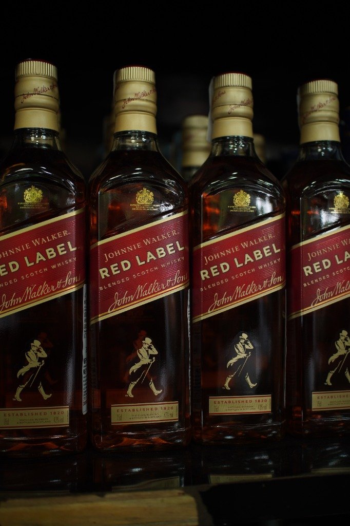 Johnnie Walker Red Label Blended Scotch Whisky in shop cellar